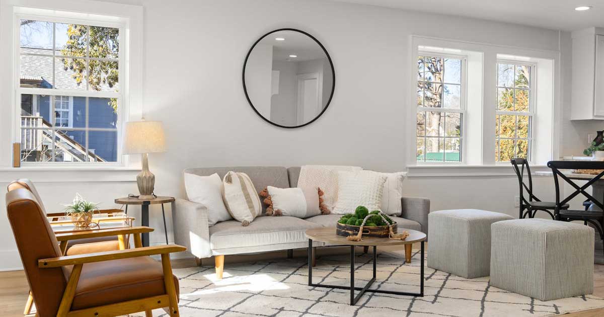 Modern home interior with natural light, cozy seating, and minimalist home decor design