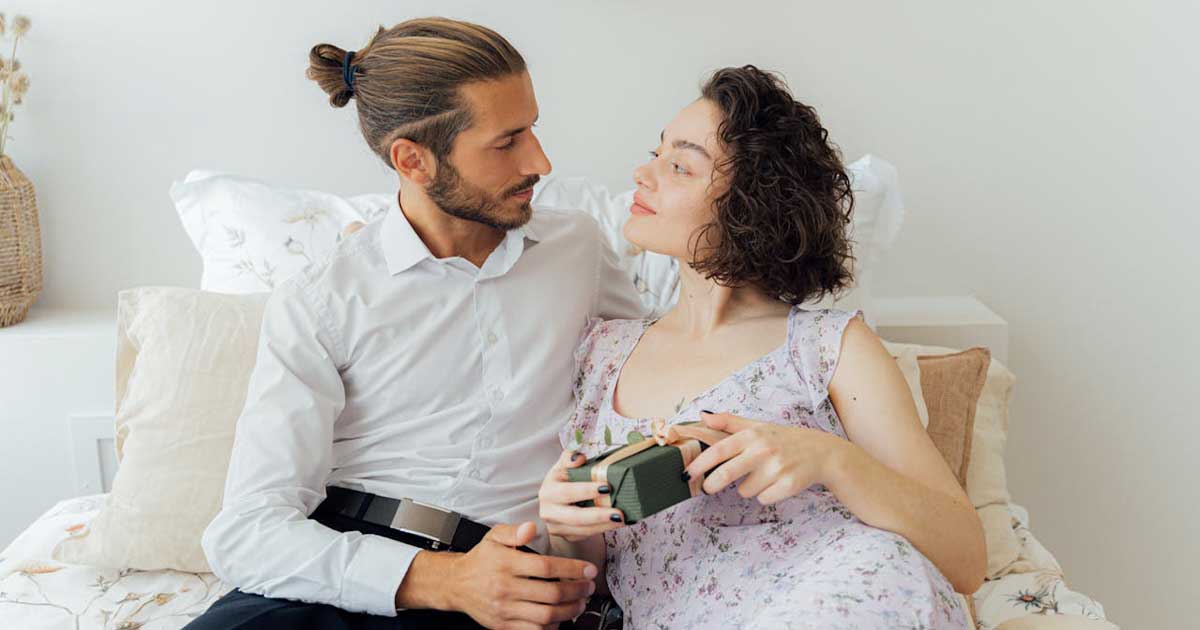 Couple sharing a thoughtful gift moment - meaningful gifts for every occasion