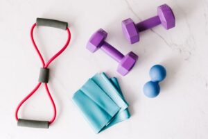 Resistance bands, dumbbells and massage ball - essential home gym equipment