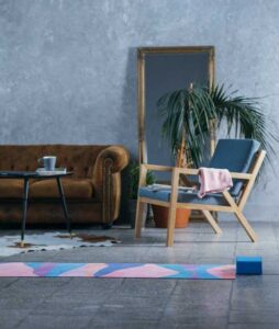 yoga mat unrolled in a peaceful space morning light, minimal home setting